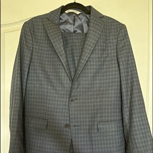 Zara suit. Dark navy. Material unknown. Great condition.